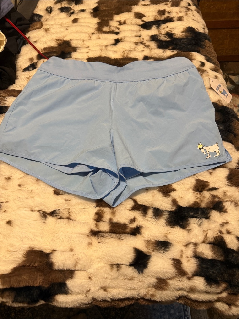 Light Blue Women’s Athletic Shorts with Embroidered Cow Detail